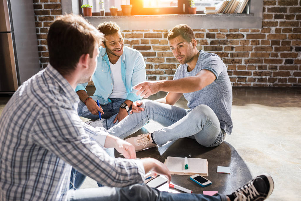 stock-photo-men-working-on-project Bridge for Veterans support image
